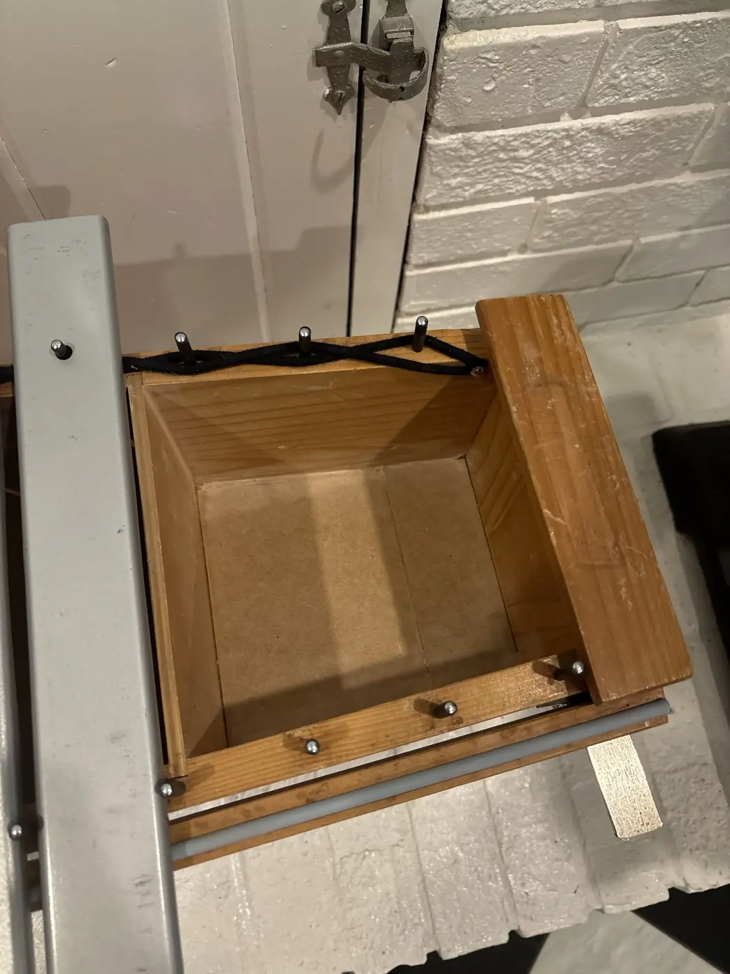 The same Orff resonator box after repair, a new panel fitted and the box restrung