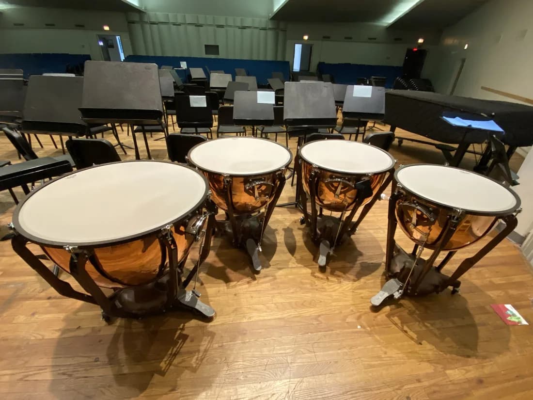 A set of four Ludwig timpani on stage for the Fort Worth Youth Orchestra
