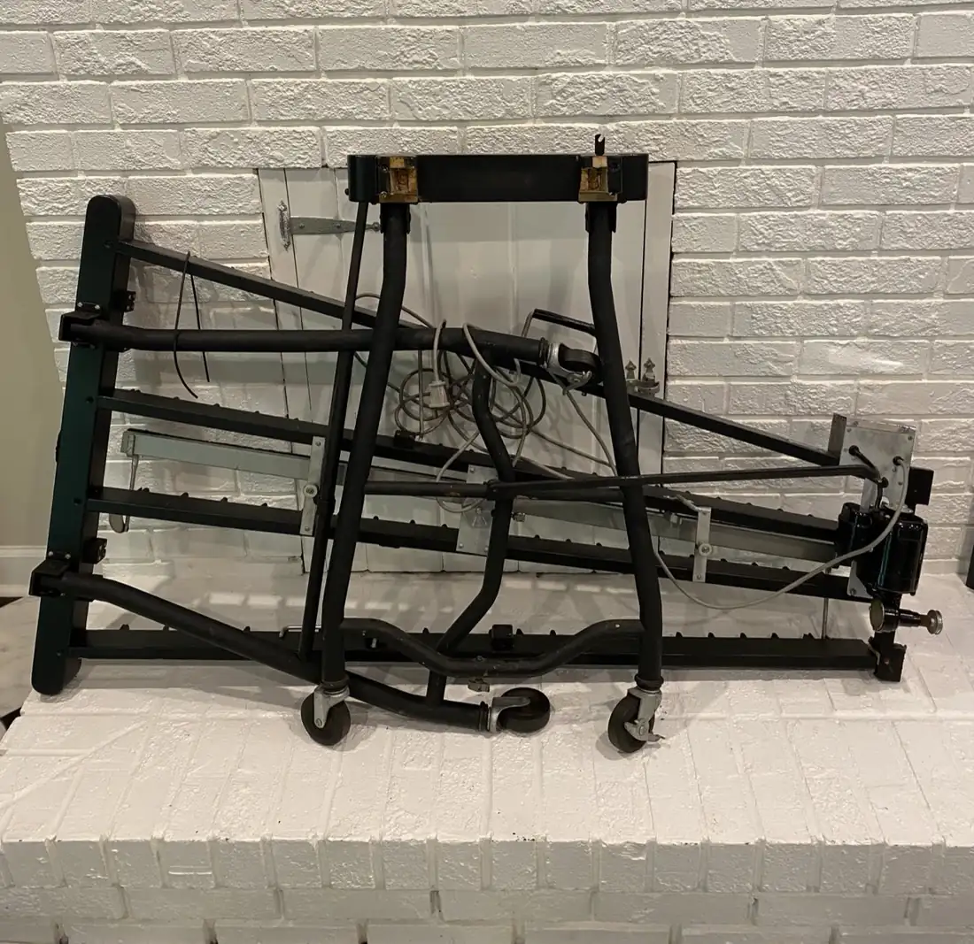 A Slingerland vibraphone frame collapsed and partly disassembled before repair