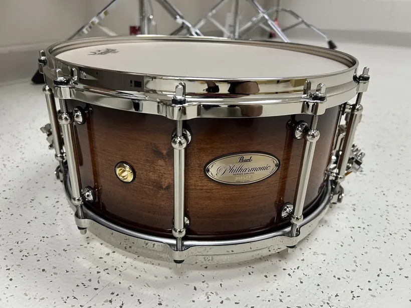A Pearl Philharmonic series concert snare drum on a stand