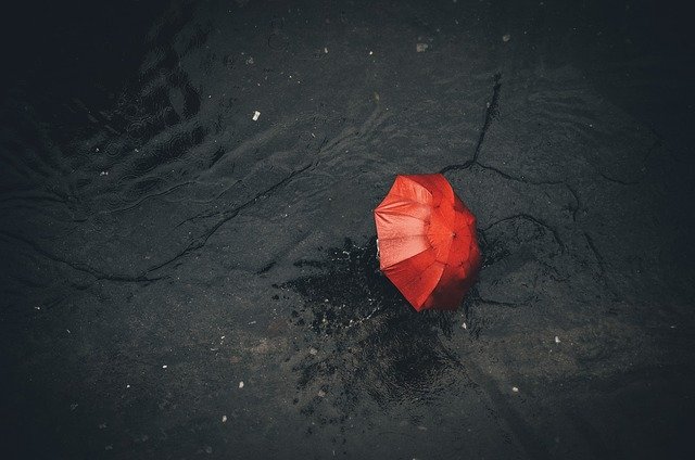 Red umbrella in the rain