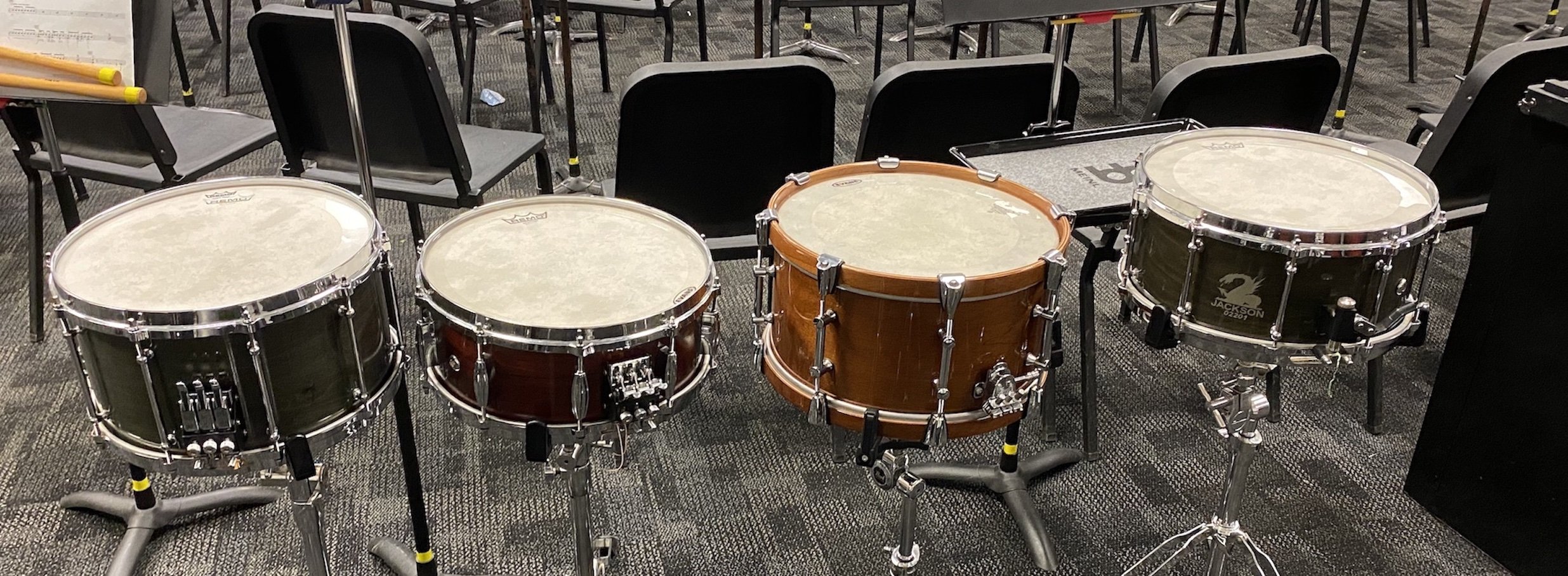 Various snare drums in different sizes and materials